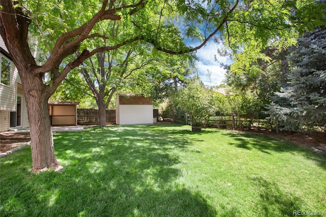 1168 E Kettle Pl, Centennial, CO 80122 - fenced backyard featuring a storage shed