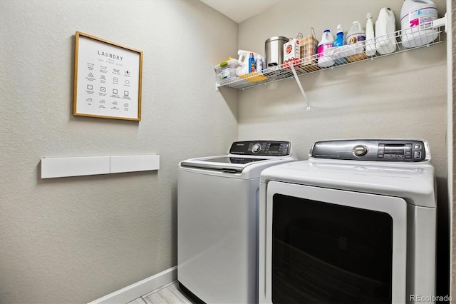 8102 Adams Fork Ave, Littleton, CO 80125 - laundry room with independent washer and dryer and baseboards