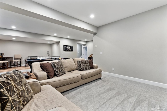 8102 Adams Fork Ave, Littleton, CO 80125 - living area featuring baseboards, carpet flooring, and recessed lighting