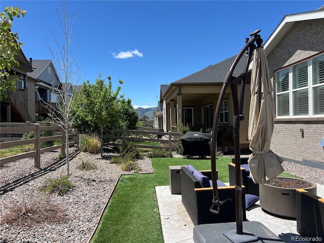 8102 Adams Fork Ave, Littleton, CO 80125 - view of yard featuring a patio area