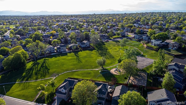 12652 Glencoe St, Thornton, CO 80241 - aerial overview of property's location with nearby suburban area and mountains