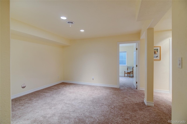 carpeted spare room featuring recessed lighting and baseboards