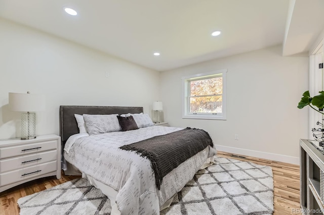 bedroom featuring light hardwood / wood-style flooring