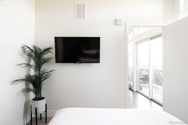 bedroom featuring visible vents and access to exterior