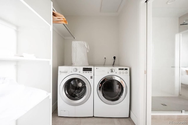 laundry area with separate washer and dryer