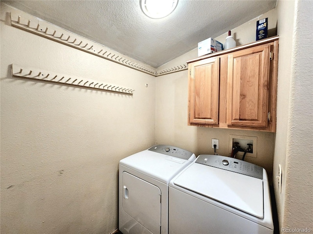 160 Shannon Ct, Rockvale, CO 81244 - washroom featuring cabinet space, washer and clothes dryer, and a textured ceiling