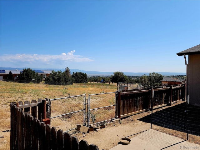 160 Shannon Ct, Rockvale, CO 81244 - view of yard featuring a gate and a rural view