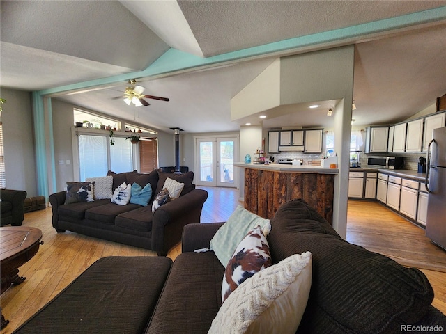 160 Shannon Ct, Rockvale, CO 81244 - living area with lofted ceiling, light wood-style floors, a ceiling fan, french doors, and recessed lighting