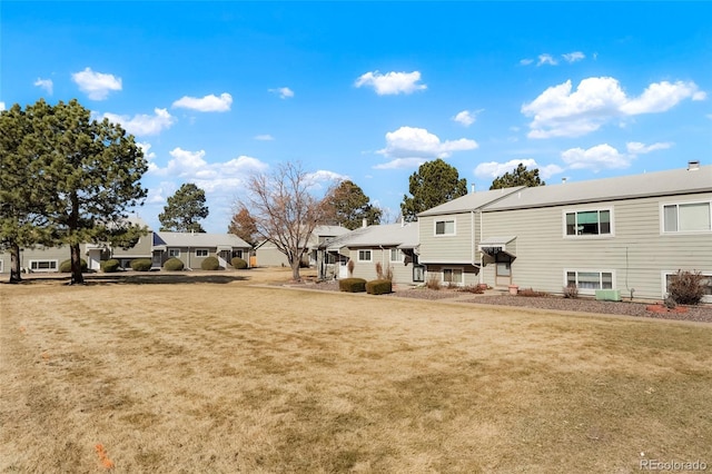 view of yard featuring a residential view