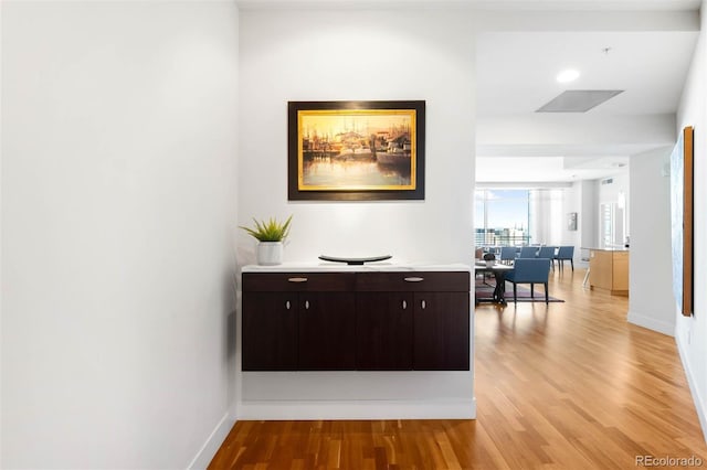 2001 Lincoln St Unit 1723, Denver, CO 80202 - hallway featuring light wood-style floors and baseboards