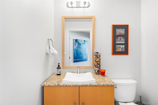 2001 Lincoln St Unit 1723, Denver, CO 80202 - half bath featuring vanity and toilet