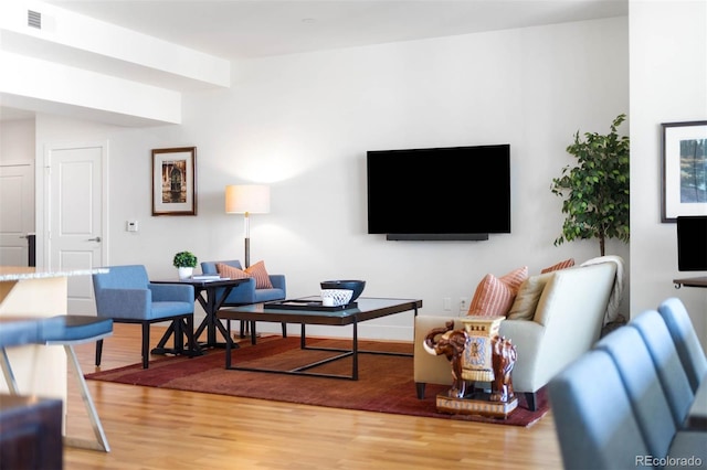2001 Lincoln St Unit 1723, Denver, CO 80202 - living room with light wood-style flooring