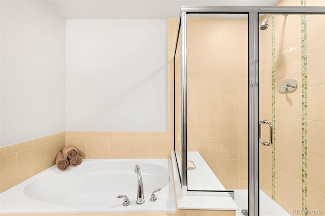 2001 Lincoln St Unit 1723, Denver, CO 80202 - full bathroom featuring a bath and a shower stall