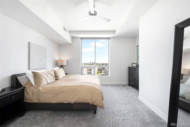 2001 Lincoln St Unit 1723, Denver, CO 80202 - carpeted bedroom featuring baseboards and a ceiling fan