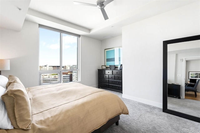 2001 Lincoln St Unit 1723, Denver, CO 80202 - carpeted bedroom with baseboards and a ceiling fan