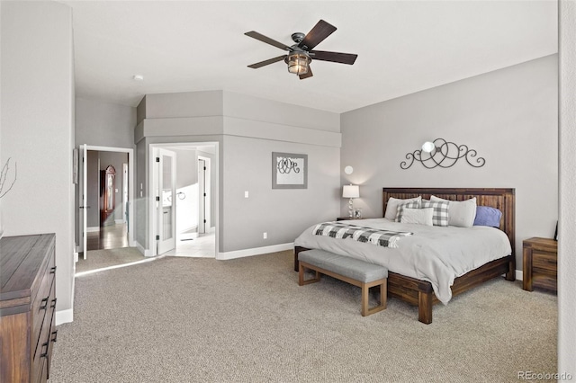 444 Pasada Way, Monument, CO 80132 - bedroom with carpet floors, a ceiling fan, and baseboards