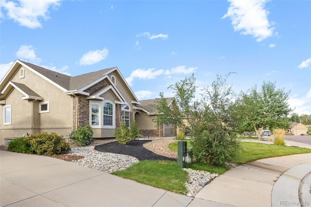 444 Pasada Way, Monument, CO 80132 - single story home featuring stone siding, stucco siding, and a front lawn