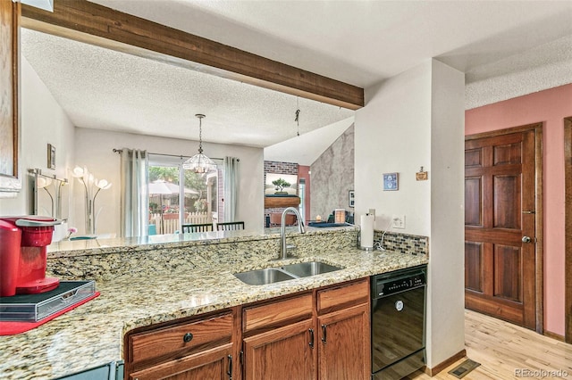 1950 S Helena St Unit D, Aurora, CO 80013 - kitchen with dishwasher, a sink, light wood-style flooring, light stone countertops, and a peninsula