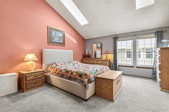 1950 S Helena St Unit D, Aurora, CO 80013 - bedroom with light carpet and lofted ceiling