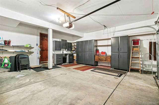 1950 S Helena St Unit D, Aurora, CO 80013 - garage featuring a garage door opener