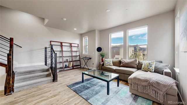 8742 E 47th Ave, Denver, CO 80238 - living area with stairway, wood finished floors, recessed lighting, and baseboards