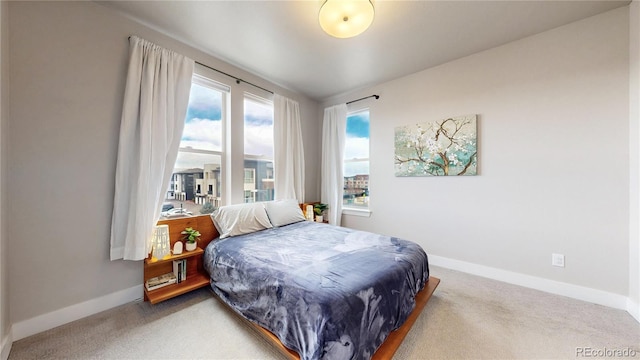 8742 E 47th Ave, Denver, CO 80238 - bedroom with baseboards and carpet flooring