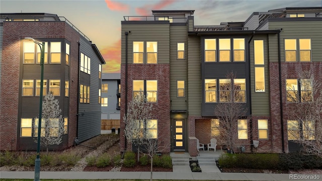 8742 E 47th Ave, Denver, CO 80238 - view of front facade with brick siding
