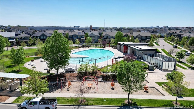 8742 E 47th Ave, Denver, CO 80238 - community pool featuring a residential view and fence