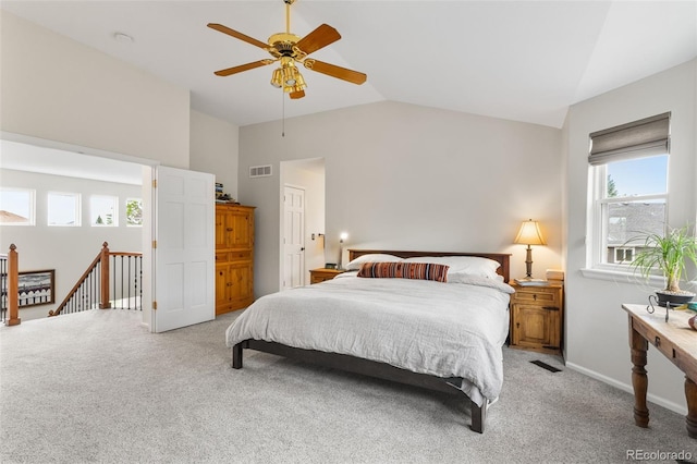 6643 Orion Ct, Arvada, CO 80007 - bedroom with light carpet, a ceiling fan, and high vaulted ceiling