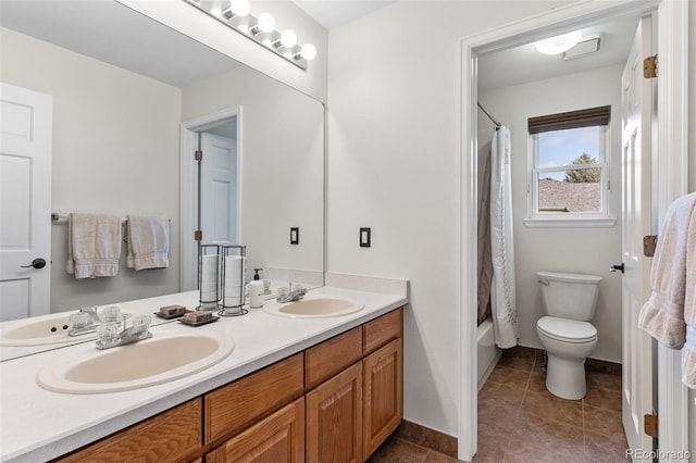 6643 Orion Ct, Arvada, CO 80007 - bathroom featuring double vanity, shower / tub combo, and tile patterned flooring