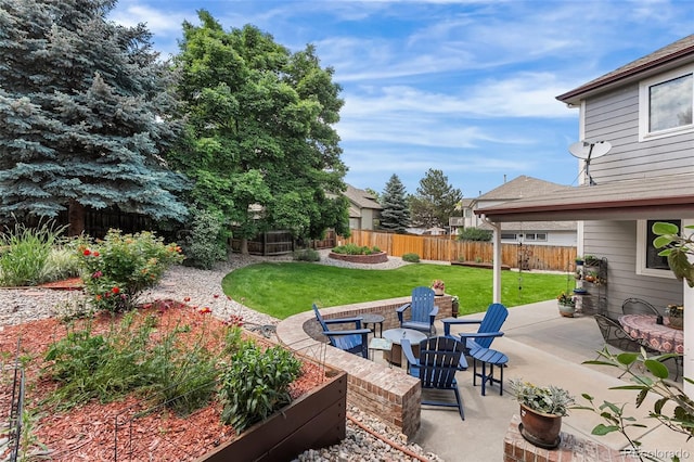 6643 Orion Ct, Arvada, CO 80007 - fenced backyard with a patio