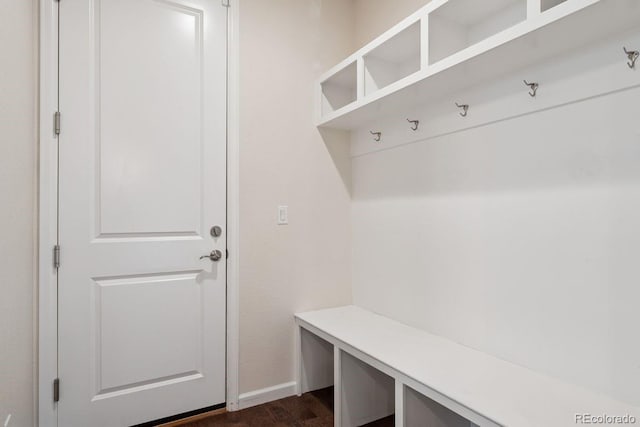 11896 Meade Ct, Westminster, CO 80031 - mudroom with dark wood-style floors and baseboards