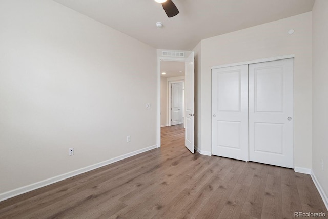 11896 Meade Ct, Westminster, CO 80031 - unfurnished bedroom with wood finished floors, a closet, and ceiling fan