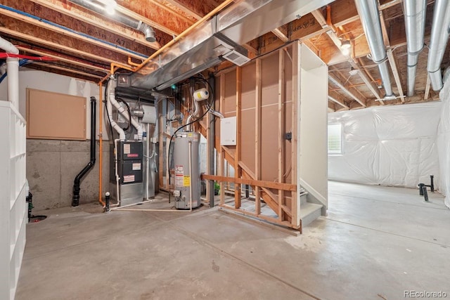 11896 Meade Ct, Westminster, CO 80031 - unfinished basement featuring gas water heater, stairs, and heating unit
