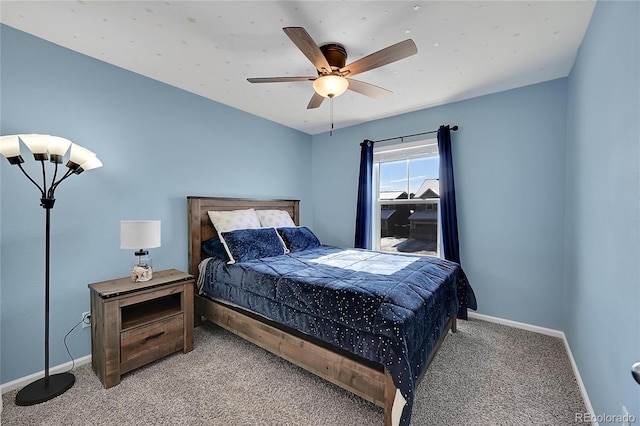 bedroom with ceiling fan and carpet floors