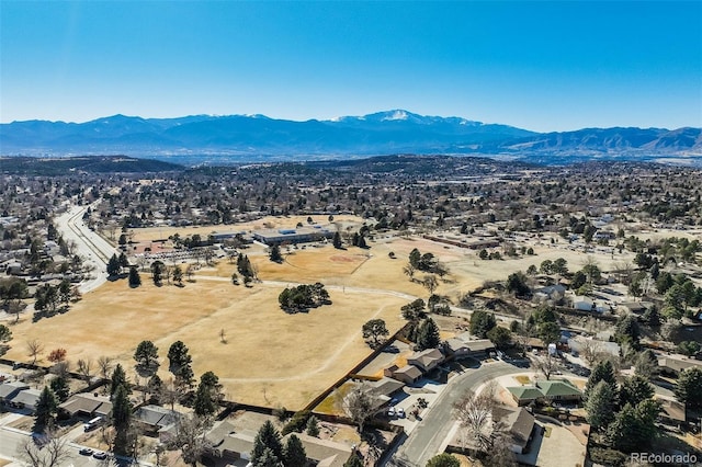 drone / aerial view featuring a mountain view