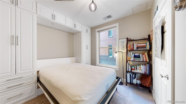 bedroom featuring dark colored carpet