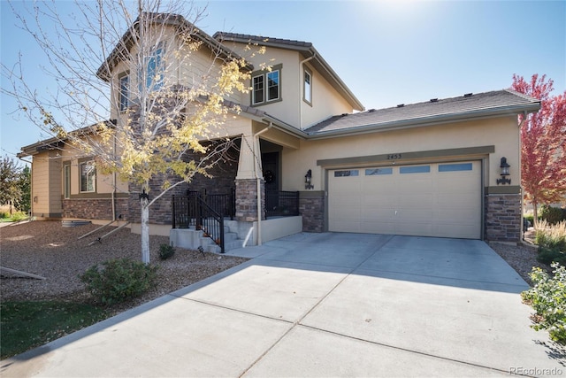 view of front of property featuring a garage