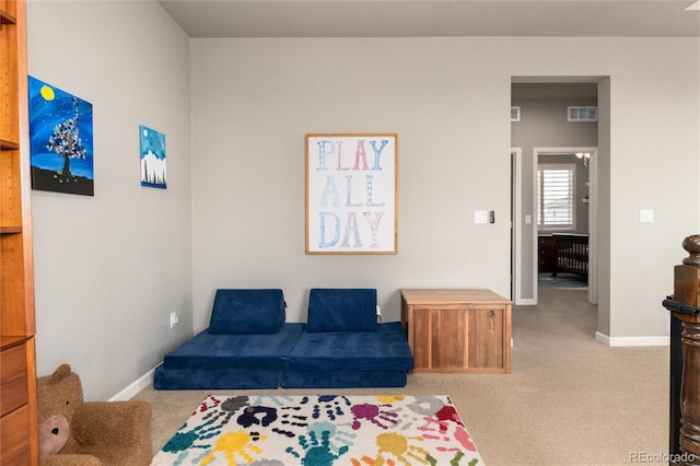 sitting room with light carpet