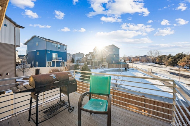 wooden deck featuring grilling area