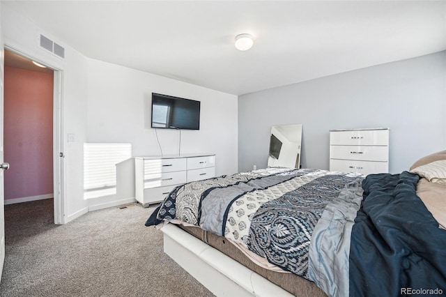 bedroom with light carpet, baseboards, and visible vents