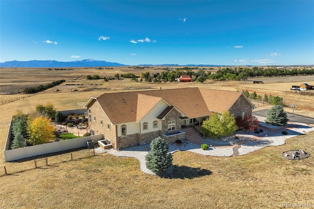 bird's eye view featuring a mountain view and a rural view