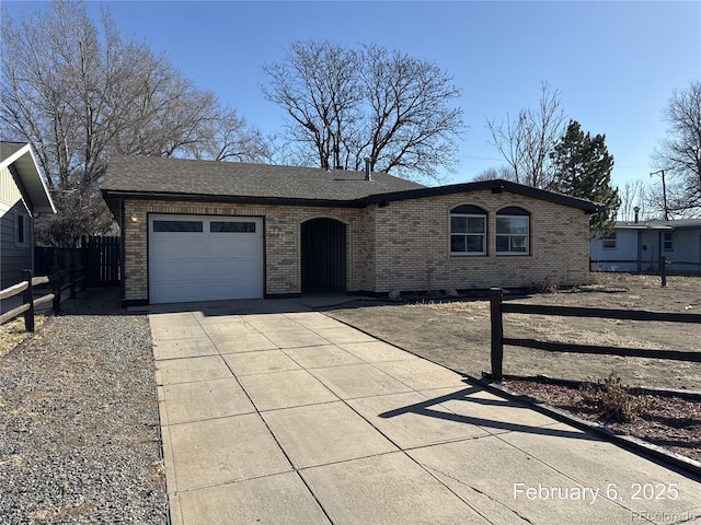 ranch-style home with a garage