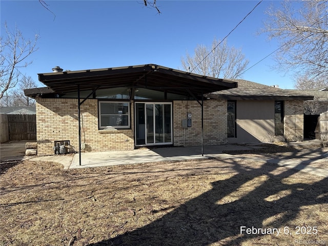 rear view of house featuring a patio