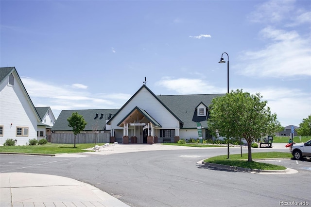 view of property featuring fence