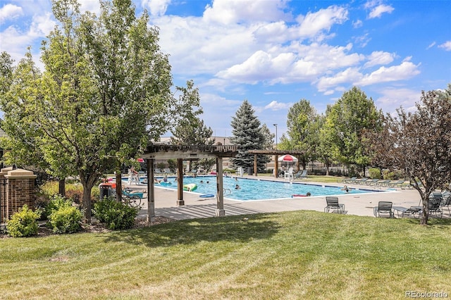 community pool featuring a lawn, a pergola, and a patio