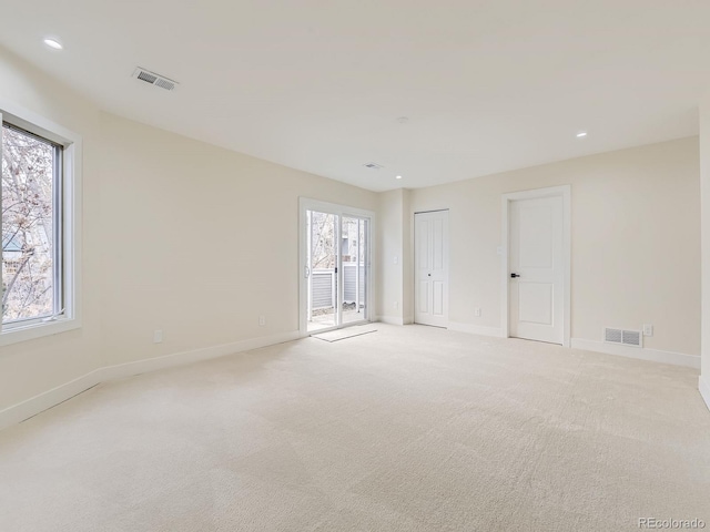 view of carpeted spare room