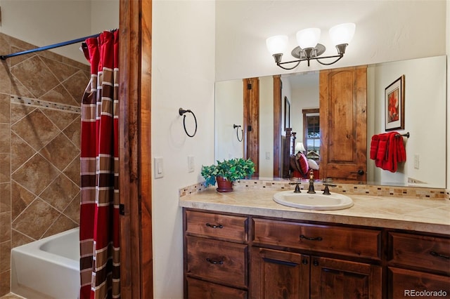 bathroom featuring vanity and shower / bath combo with shower curtain