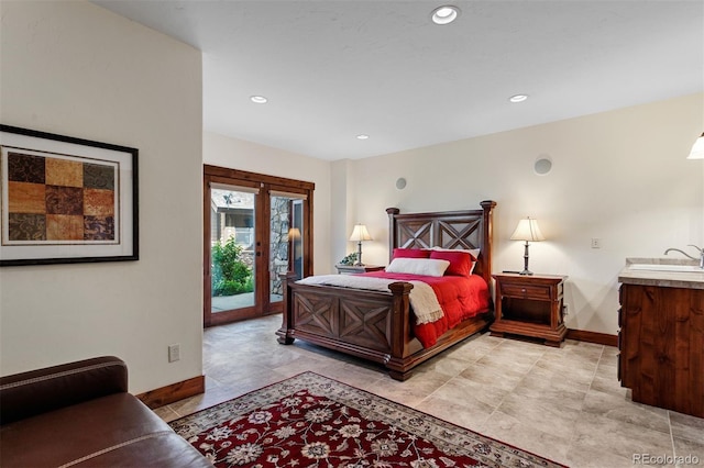 bedroom with access to outside and french doors