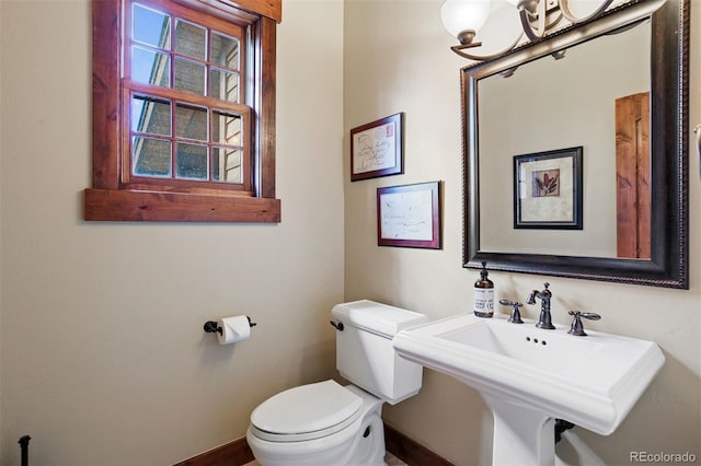 bathroom with toilet and sink